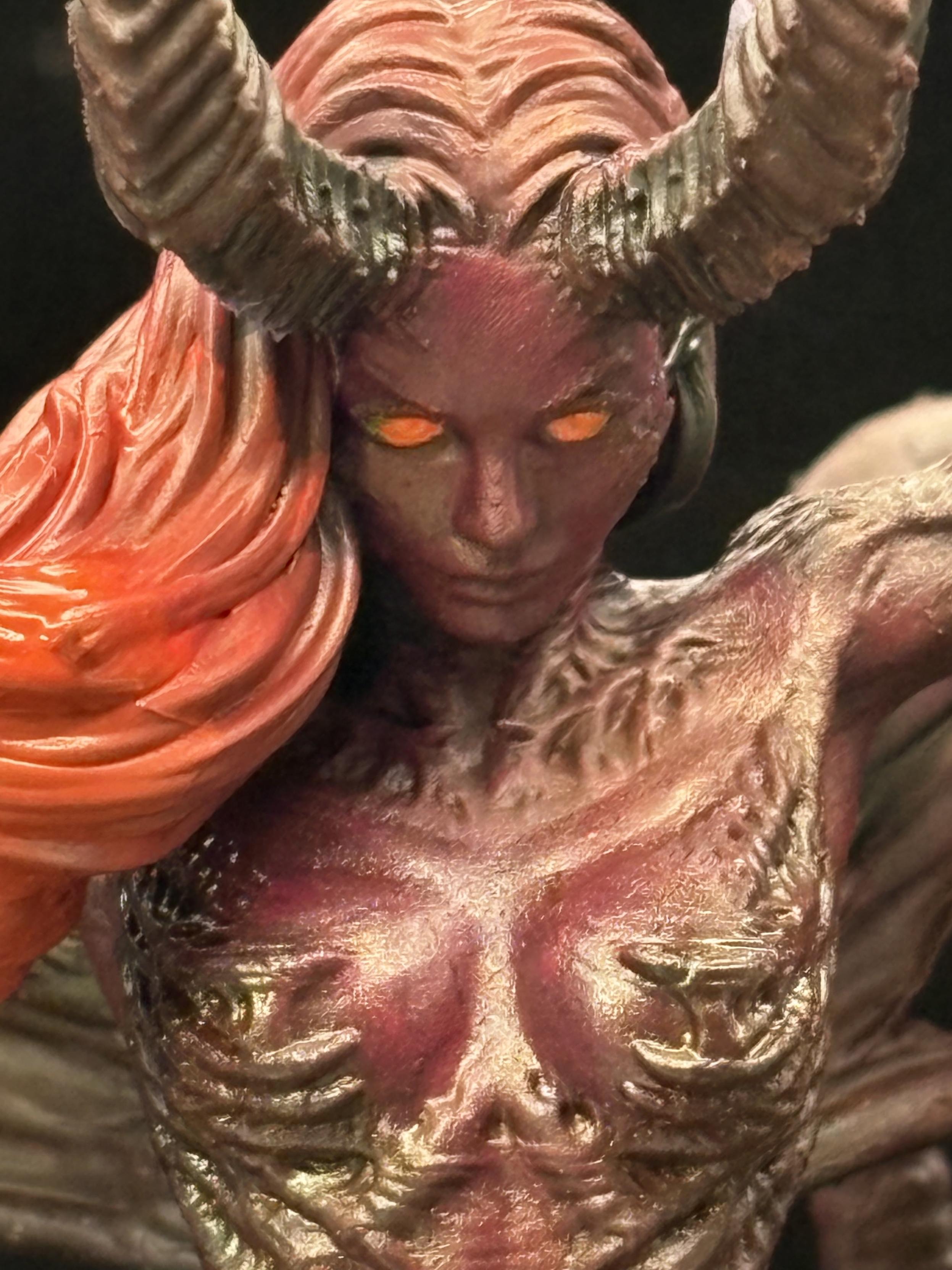 Close up of a succubus with glowing orange eyes